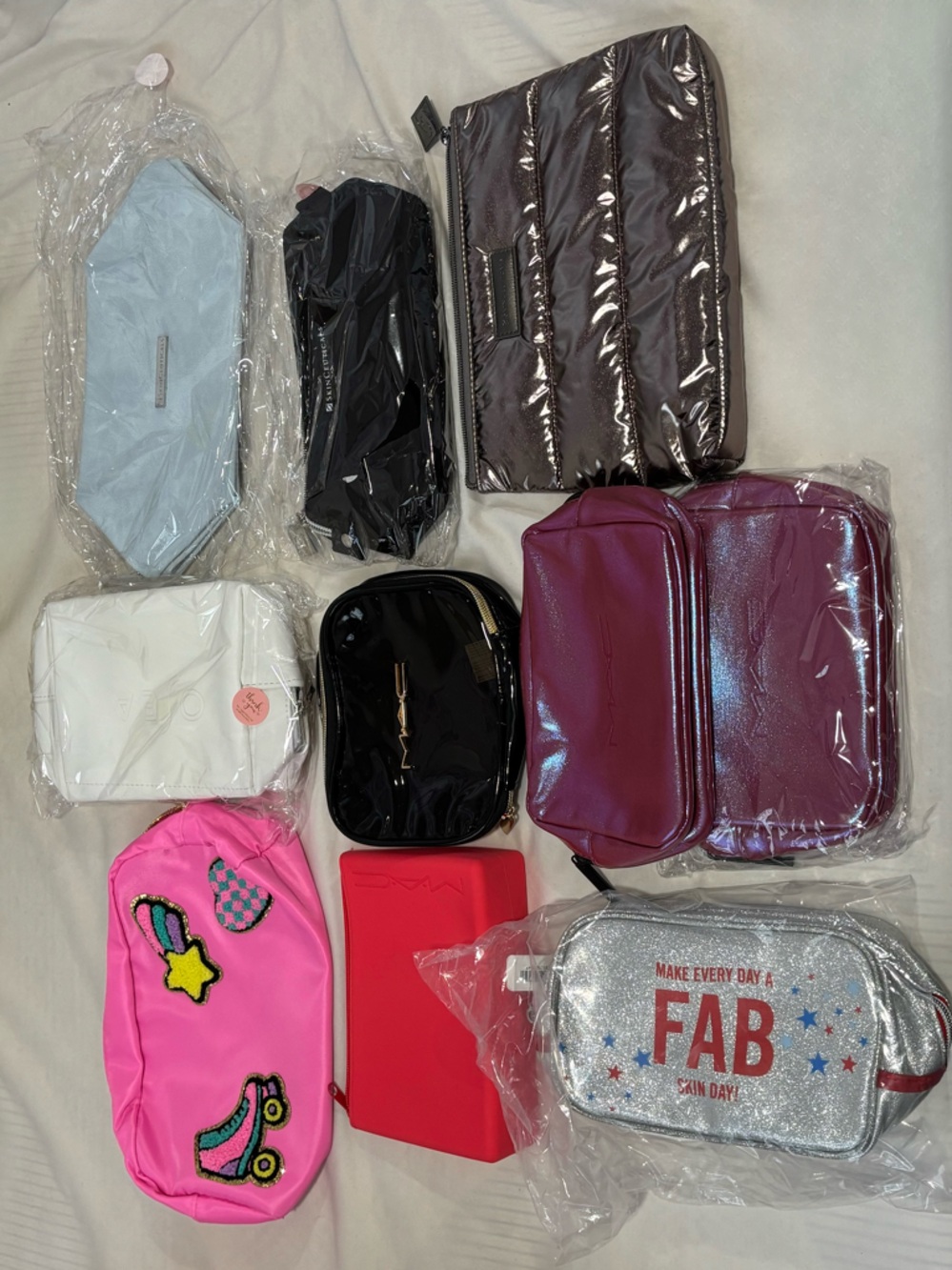 small-medium branded makeup & cosmetic pouches/bags (lot of 19)